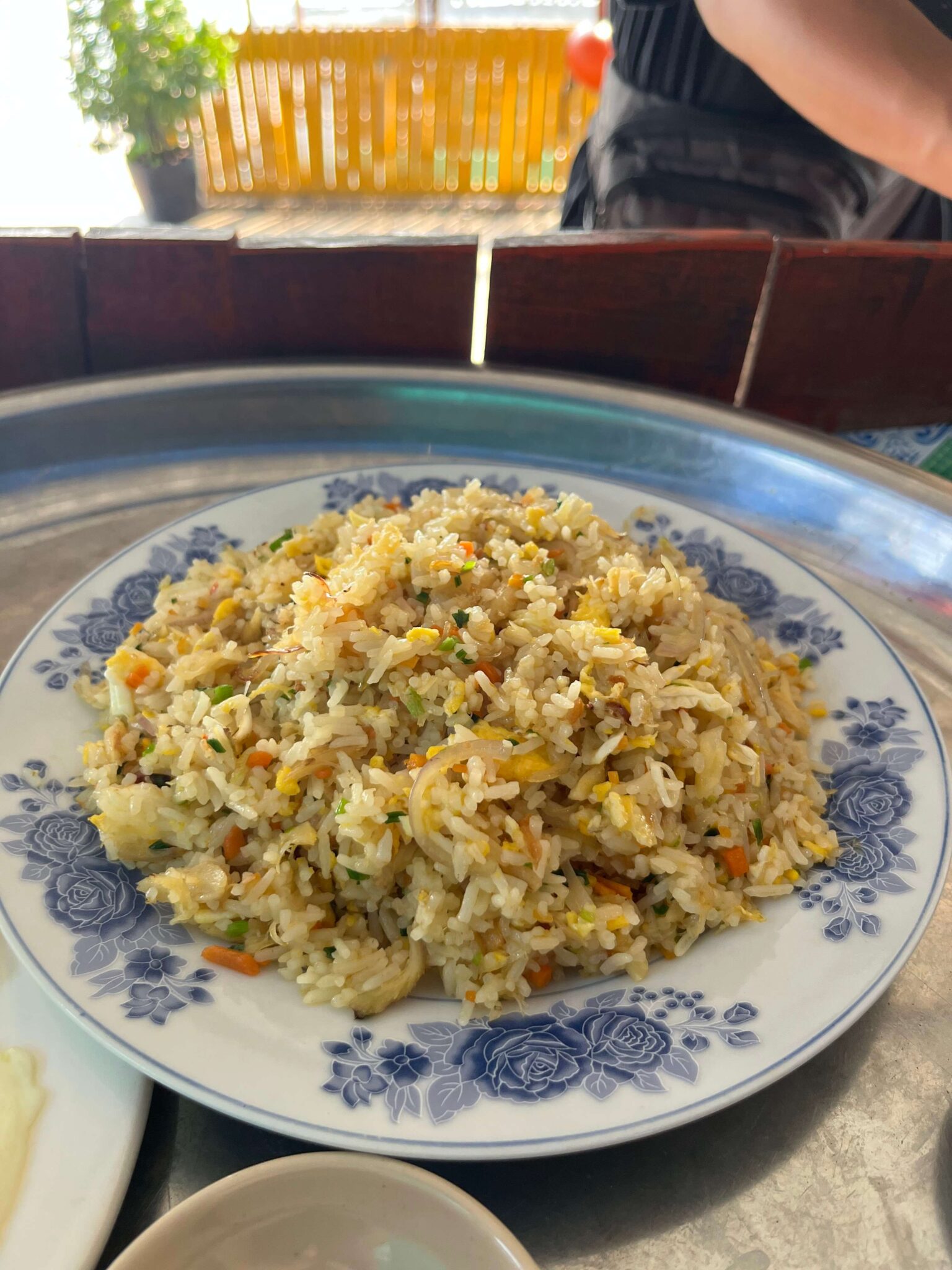 a plate of crab fried rice