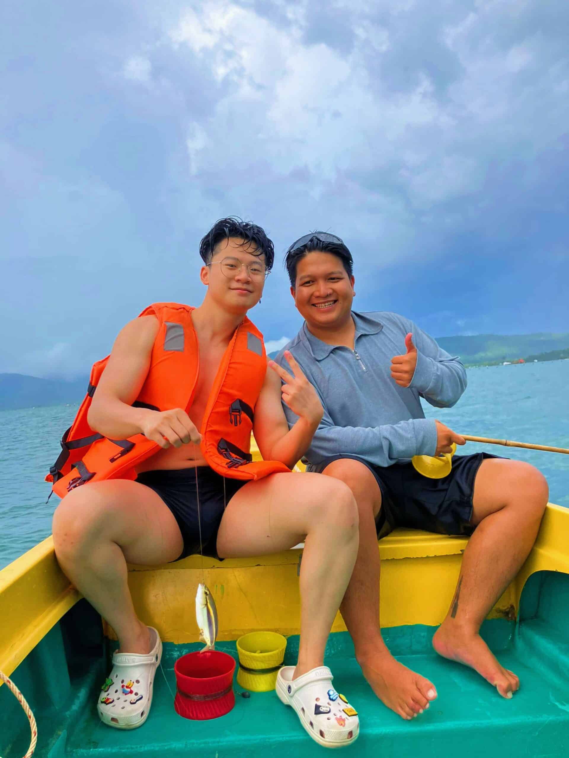Two people catching fish in Phu Quoc