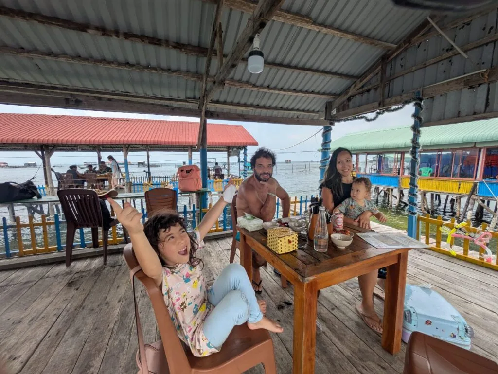 A family sitting at a floating restaurant, phu quoc