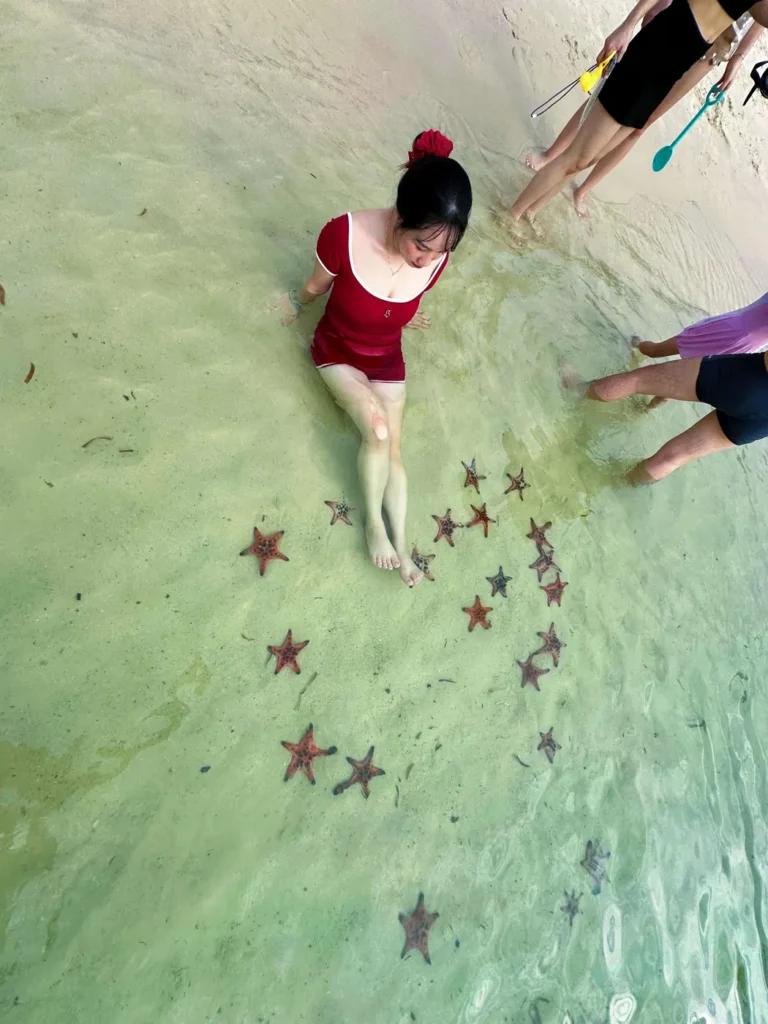 Woman chilling with starfish